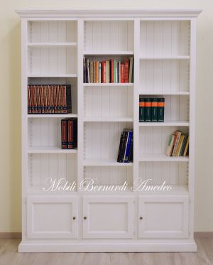 Libreria in legno bianco con 3 vani 3 antine e ripiani a giorno